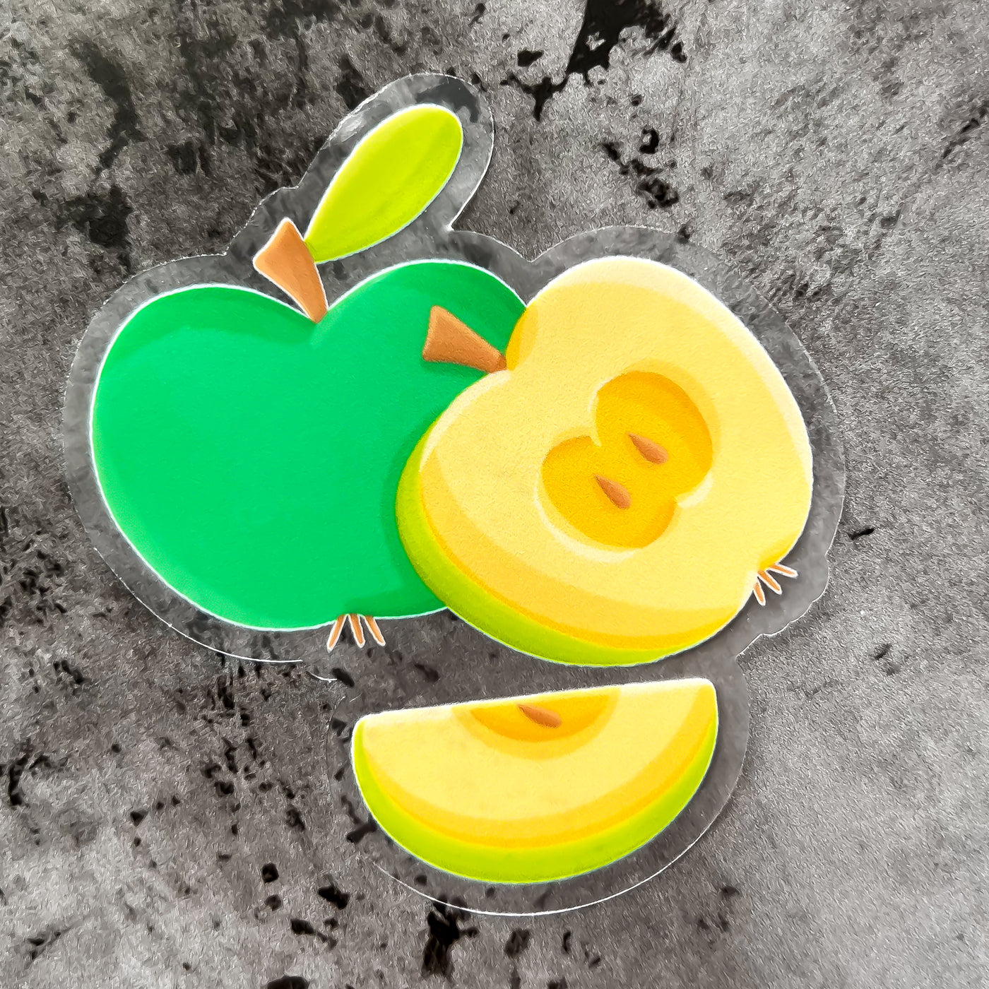 Green apple vinyl sticker, offered in classic white with white background and white border or clear sticker with a solid white backing, but is clear once the backing is removed. Stickers for kids and teachers by Simpliday Paper by Olga Nagorna.