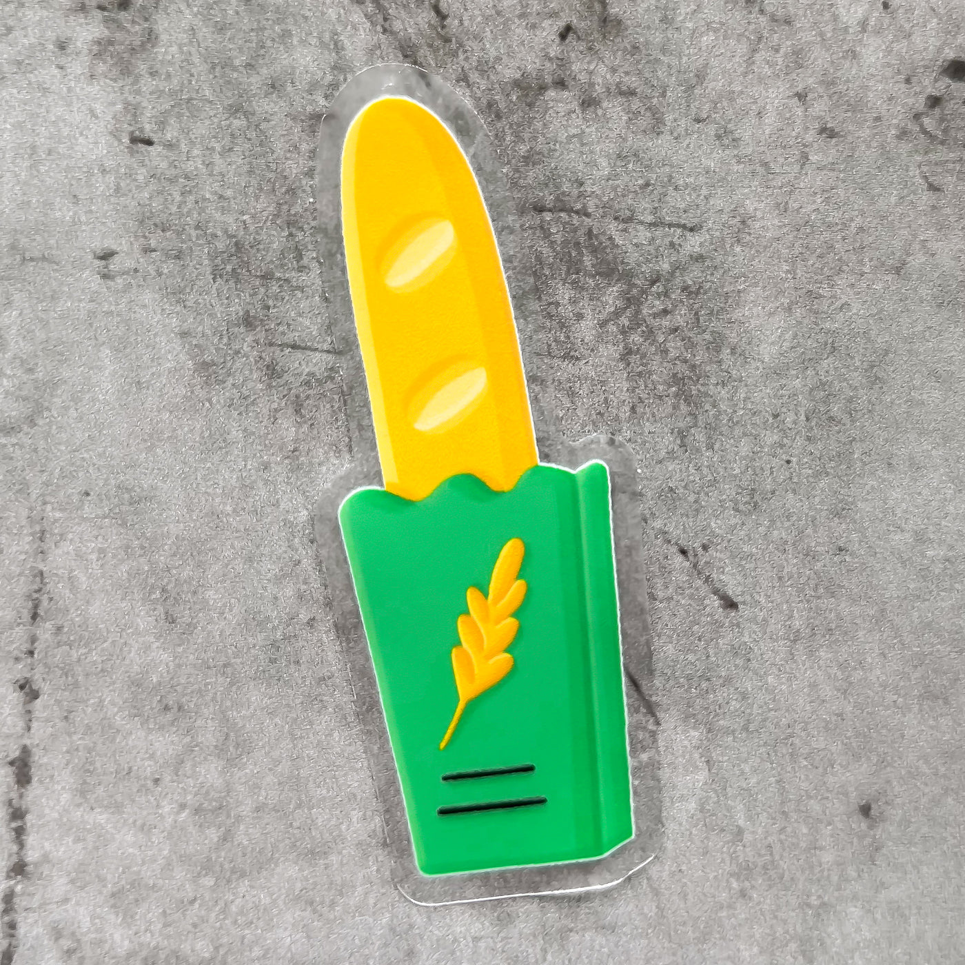 Baguette vinyl sticker, offered in classic white with white background and white border or clear sticker with a solid white backing, but is clear once the backing is removed.