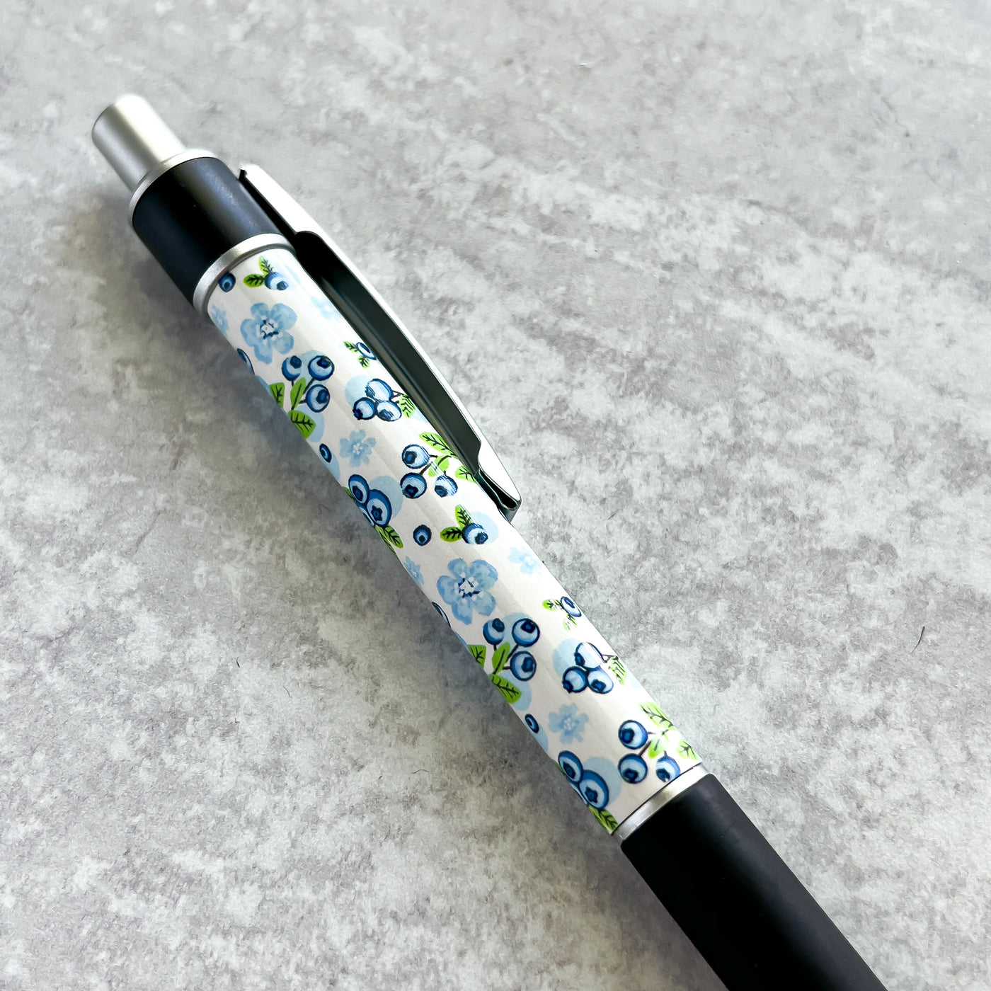 Our beautiful Garden Blueberries Pen is the perfect companion for your Simpliday Paper notebooks and notepads and a staple for your desk or purse. This premium ballpoint pen features Simpliday Paper artwork that wraps entirely around the pen.&nbsp;