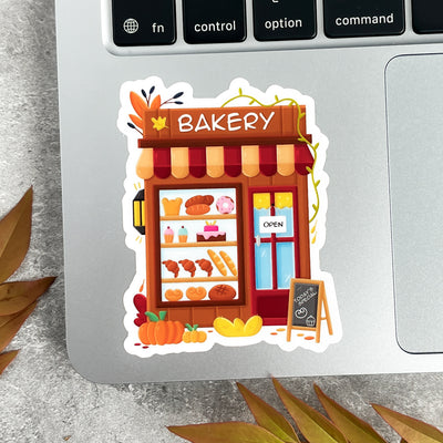 Sticker of a bakery on a laptop keyboard.
