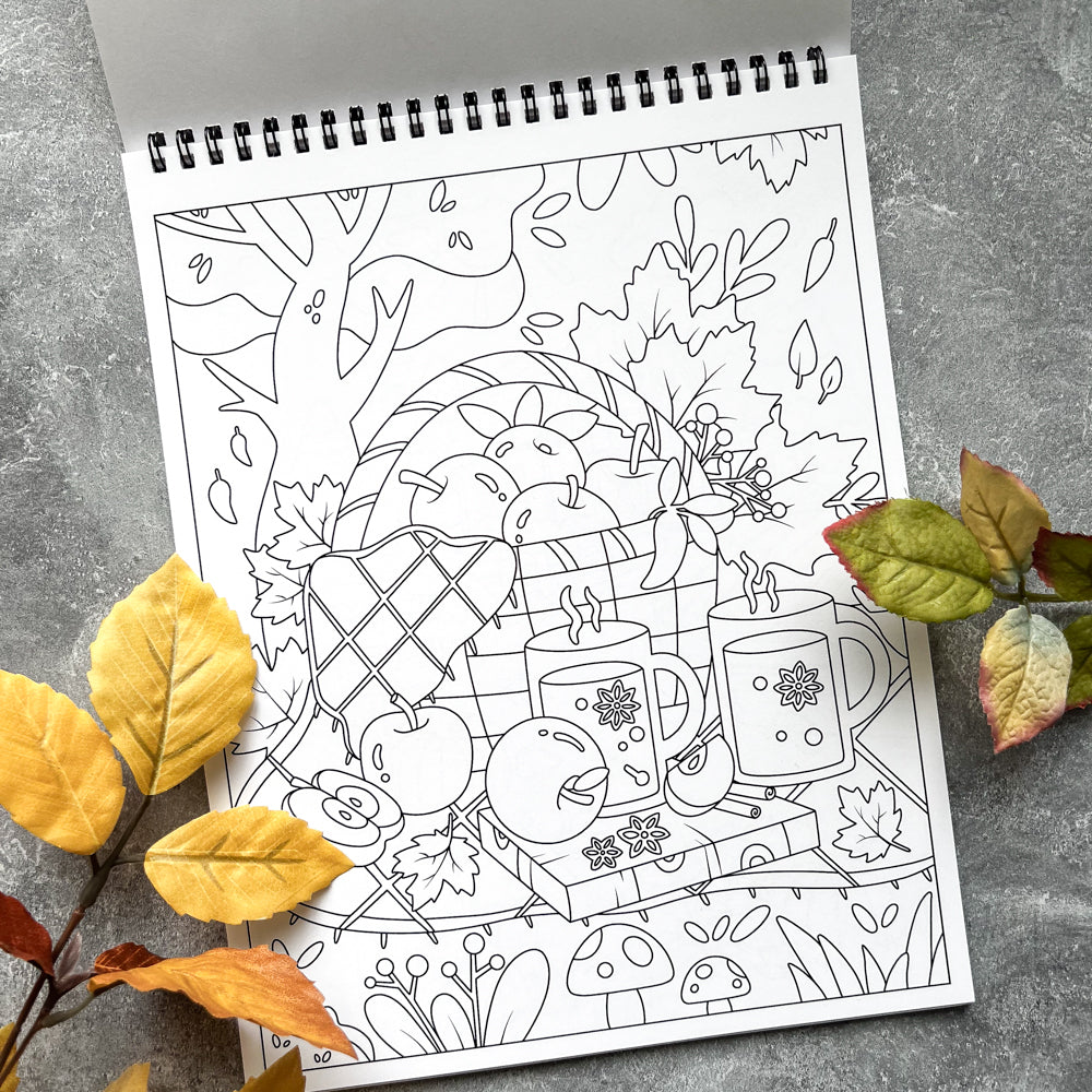 Color your way through autumn, a coloring book filled with pumpkin spice moments and cozy scenes. The perfect quality time activity for you and your kids. This book features 20 unique, line art drawings, spiral-bound for easy coloring of each page, and is single-sided to prevent bleeding onto the next page when coloring with markers.
