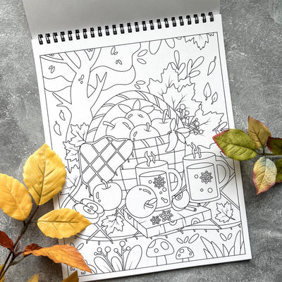 Color your way through autumn, a coloring book filled with pumpkin spice moments and cozy scenes. The perfect quality time activity for you and your kids. This book features 20 unique, line art drawings, spiral-bound for easy coloring of each page, and is single-sided to prevent bleeding onto the next page when coloring with markers.
