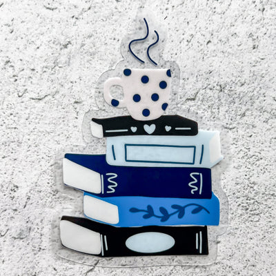 Stack of books in blues clear vinyl waterproof sticker by Simpliday Paper.