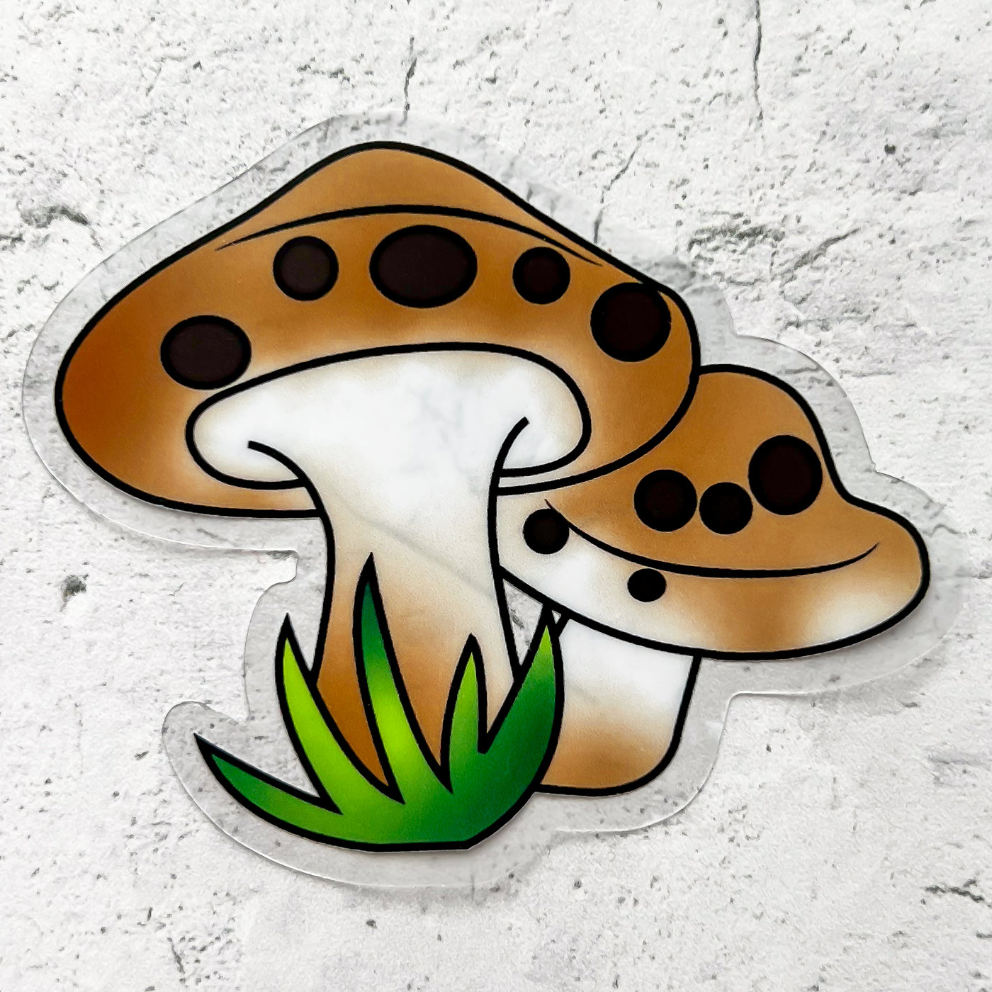 Brown mushroom with green grass clear vinyl sticker by Simpliday Paper Olga Nagorna Paper.