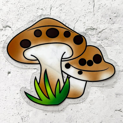 Brown mushroom with green grass clear vinyl sticker by Simpliday Paper Olga Nagorna Paper.