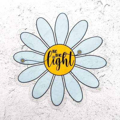 Be the Light clear vinyl blue daisy sticker by Simpliday Paper, Olga Nagorna.