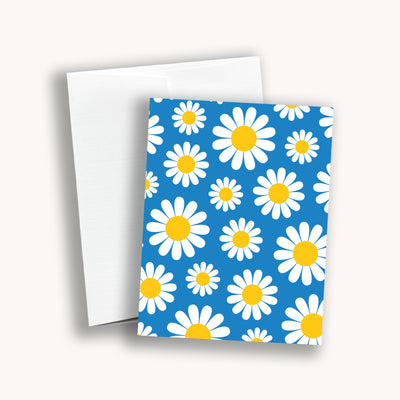 Daisies on blue background greeting card 4.25" x 5.5" by Simpliday Paper, Olga Nagorna.