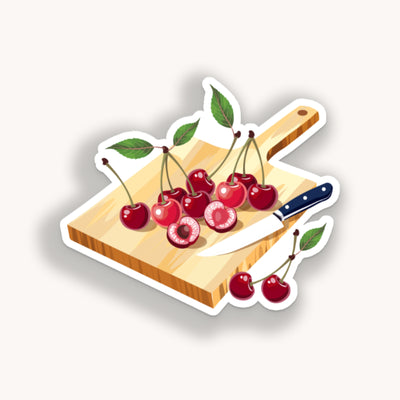 Sticker of cherries on a cutting board with a knife on a white background.