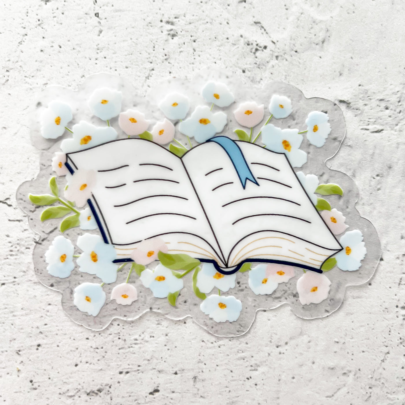 Floral book clear vinyl sticker by Simpliday Paper.