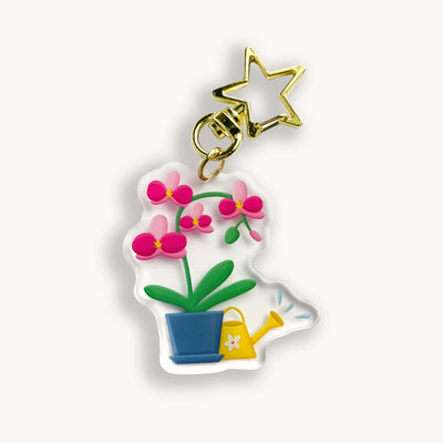 Pink orchid acrylic keychain. Double-sided, backside is the same design, but reversed.