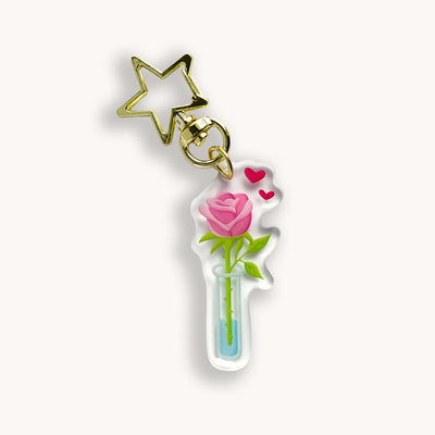 Pink rose acrylic keychain. Double-sided, backside is the same design, but reversed.