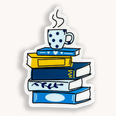Stack of yellow and blue books with a mug on top. Clear vinyl waterproof sticker.