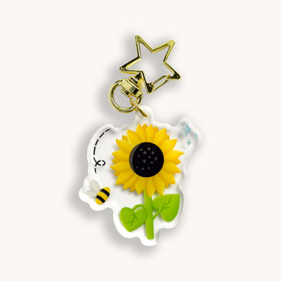 Sunflower acrylic keychain. Double-sided, backside is the same design, but reversed.